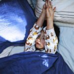 A child sleeping in bed, highlighting the nighttime increase in croup symptoms