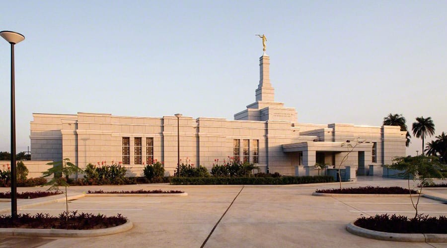 A serene Mormon Temple bathed in sunlight, symbolizing faith and tradition.