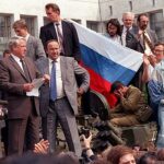 Boris Yeltsin atop a tank during the August Coup, symbolizing resistance against hardliners and the crumbling Soviet authority.