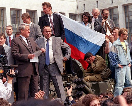 Boris Yeltsin atop a tank during the August Coup, symbolizing resistance against hardliners and the crumbling Soviet authority.