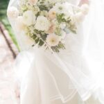 Candid moment of a bride and groom during their William Aiken House wedding, captured in true-to-life colors.