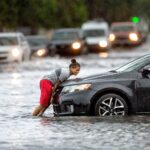 Car submerged in flood water after a hurricane