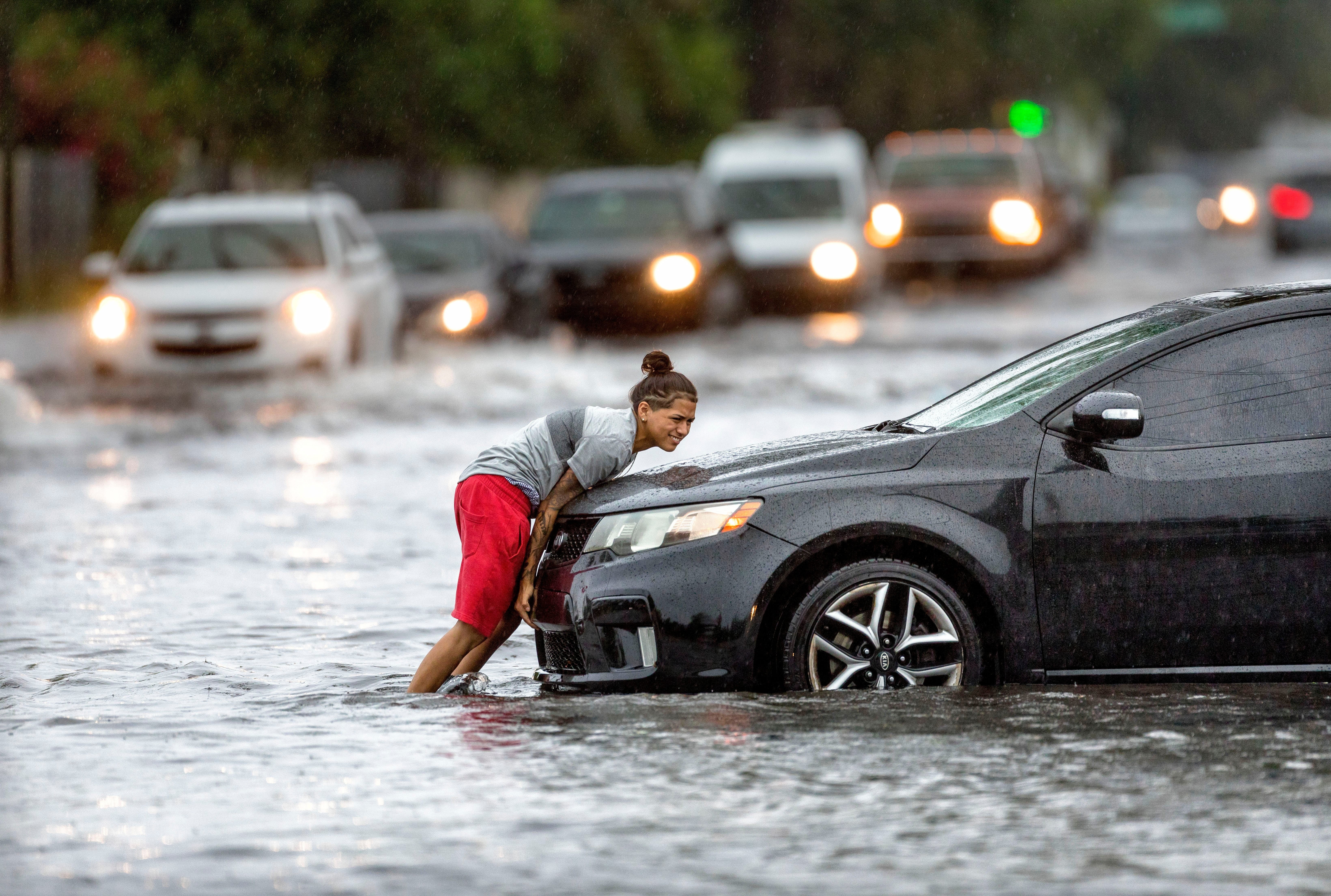 Car submerged in flood water after a hurricane