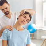 Chiropractor carefully adjusts a patient's neck to relieve pain and improve spinal alignment.