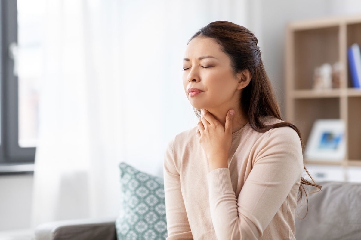 Dental hygiene tools including toothbrush, toothpaste, and floss, illustrating potential causes of tasting blood in your mouth related to gum issues.