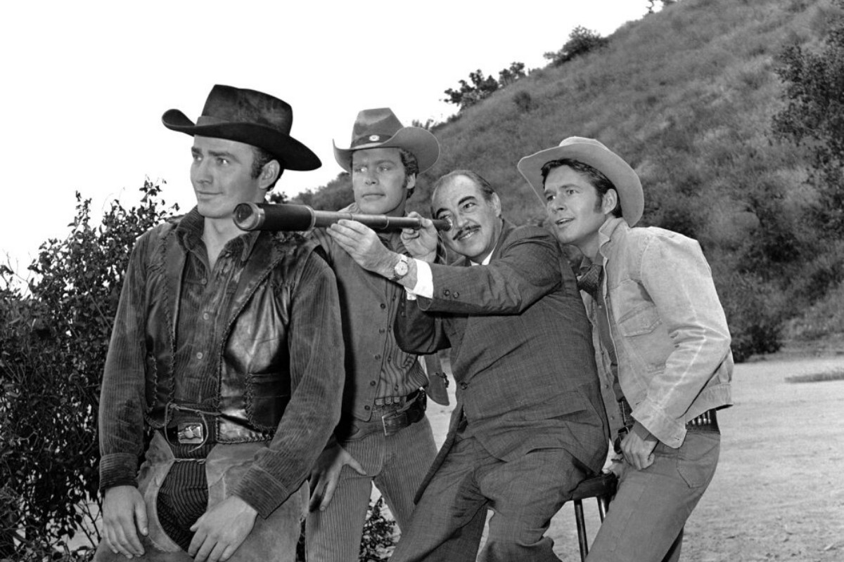 Doug McClure as Trampas with cast of The Virginian