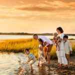 Duxbury Beach Family Photo Session - Family walking on the beach during golden hour