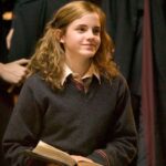 Hermione sits with a book in Harry Potter and the Goblet of Fire