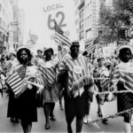 ILGWU Local 62 marches in a Labor Day parade. Source: https://www.flickr.com/photos/kheelcenter/5278801929/in/photolist-7iEKir-93teUn-93wkss-93v4aV-93wxPL-21eteK3-93wxK1-93wkjy-93tf1z-93wiWj-93wiSJ-93teFx-93wUPj-93teXv-93wYkh