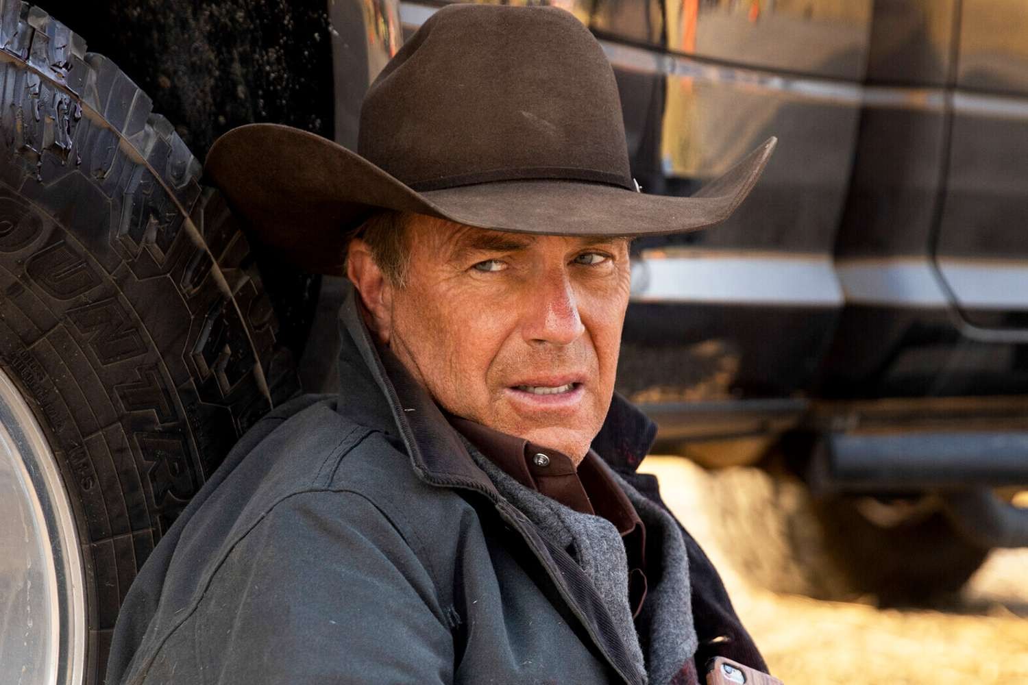 Kevin Costner as John Dutton in Yellowstone, amidst character's controversial death storyline.