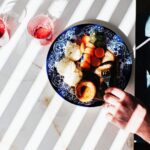 Overhead shot of a healthy meal with various food groups, casting soft shadows, suggesting a balanced diet.-2