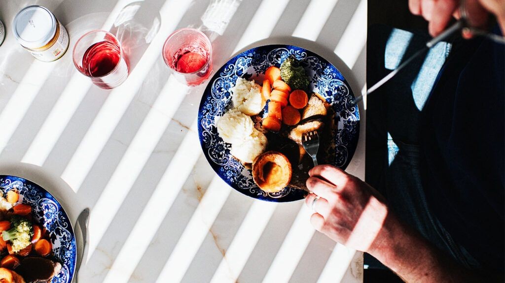 Overhead shot of a healthy meal with various food groups, casting soft shadows, suggesting a balanced diet.-2