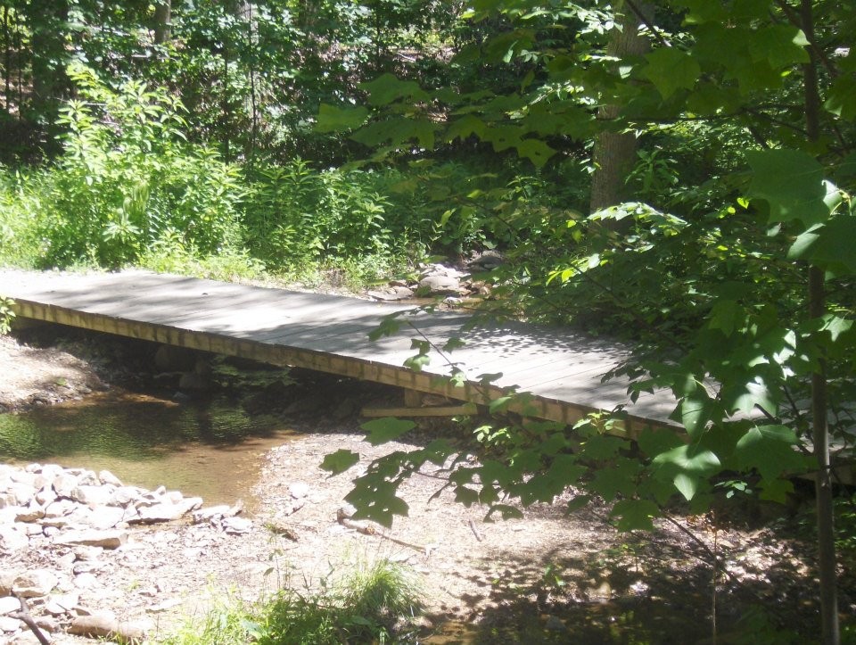 Peaceful stream at Mt. Aetna Seventh-day Adventist summer camp, a cherished childhood memory for an ex-SDA member.