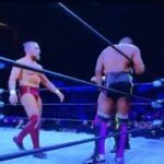 Pixelated image of wrestlers on Sling TV, highlighting poor stream quality