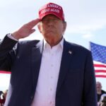 Republican presidential candidate former President Donald Trump salutes at a campaign rally on March 16, 2024, in Vandalia, Ohio. (Photo via AP Photo/Jeff Dean.)