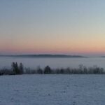 Valley fog in Harrison County, Indiana, showcasing dense ground-level cloud cover due to nighttime cooling.