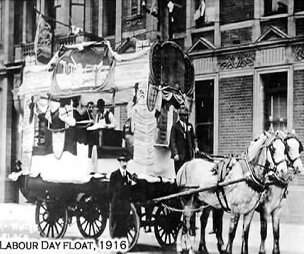 Vintage postcard of a Labor Day parade float from 1916, illustrating early celebrations and community involvement in Labor Day