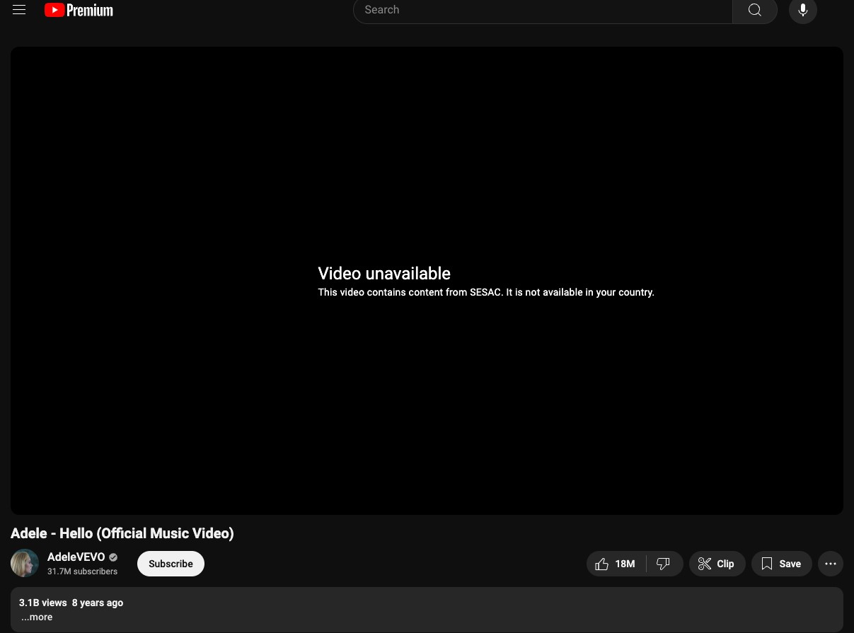 YouTube Music displaying 'Video unavailable' message for Adele's 'Hello' due to SESAC licensing issues, indicating content ban in some countries.