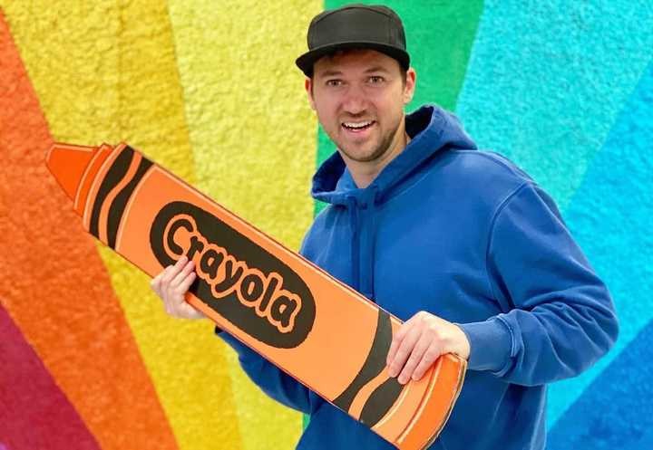 Clayton Grimm as Blippi, interacting with children