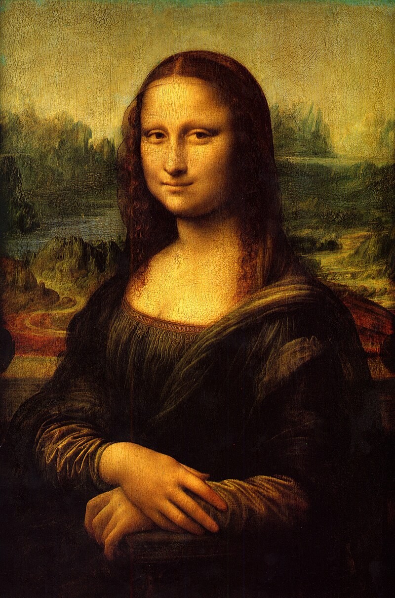 Mona Lisa at the Louvre Museum, protected by bulletproof glass, drawing large crowds of viewers