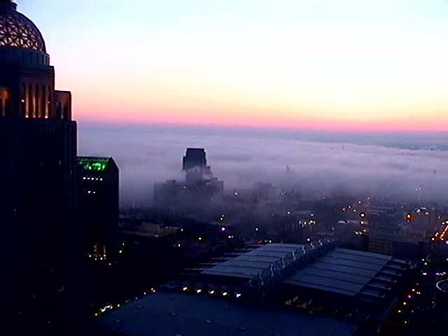 Fog rolling into downtown Louisville from the Ohio River
