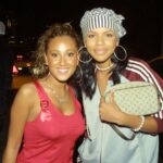 Adrienne Bailon and Kiely Williams performing together