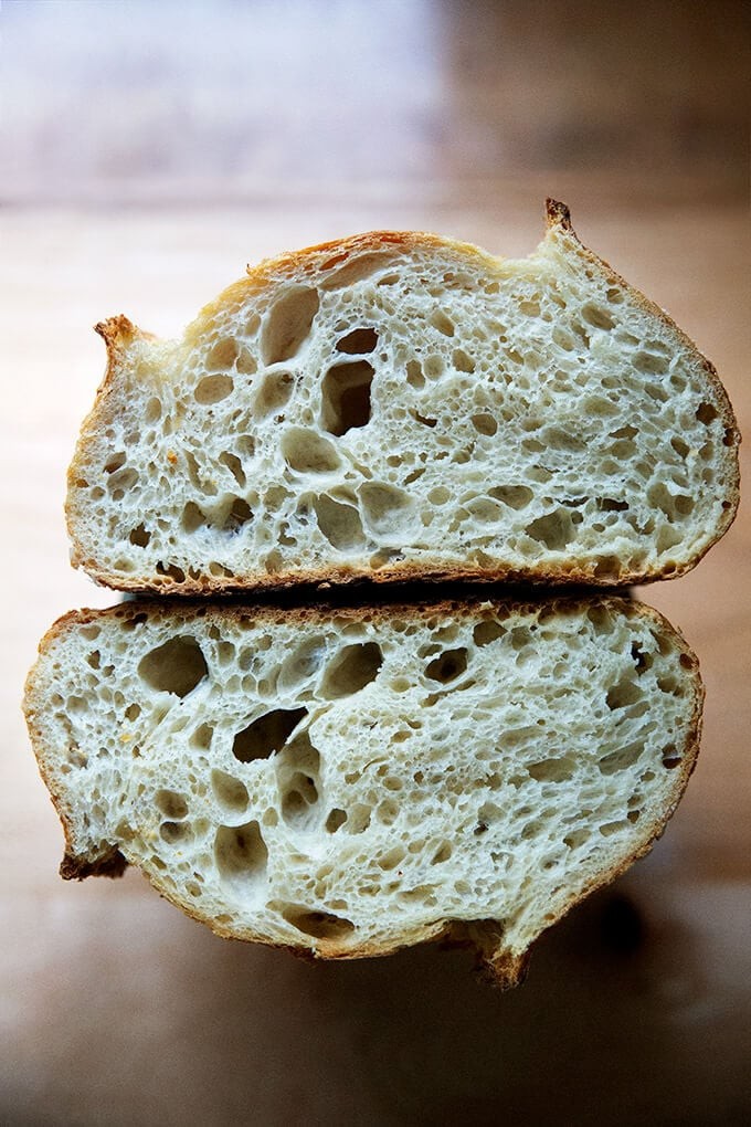 A halved loaf of sourdough bread.