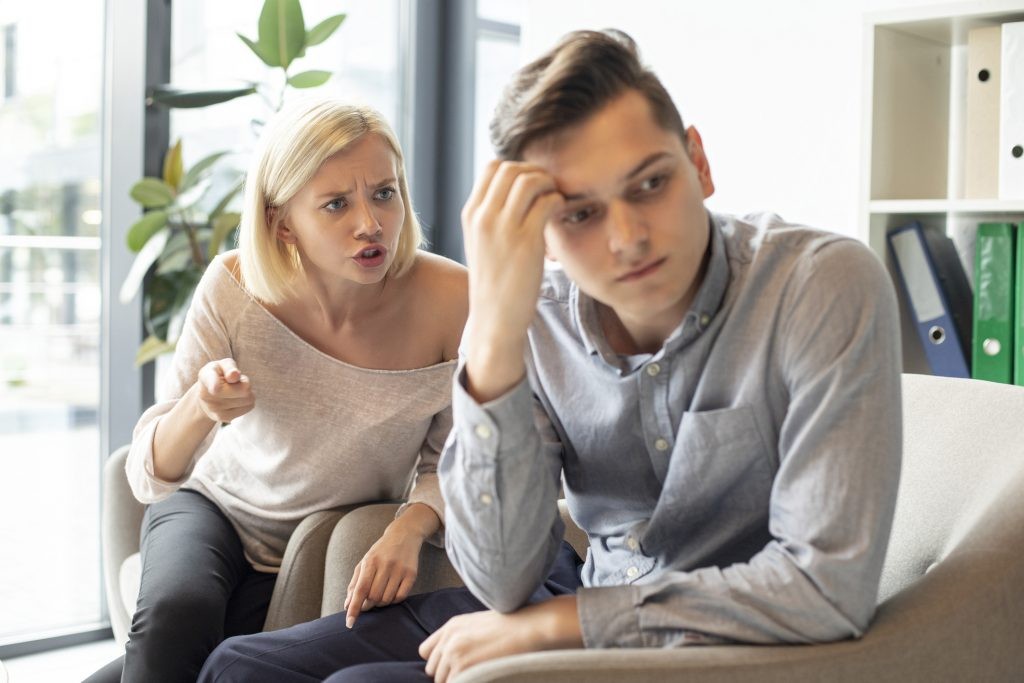 A couple yelling at each other, emphasizing the breakdown in communication and the emotional distress it causes.