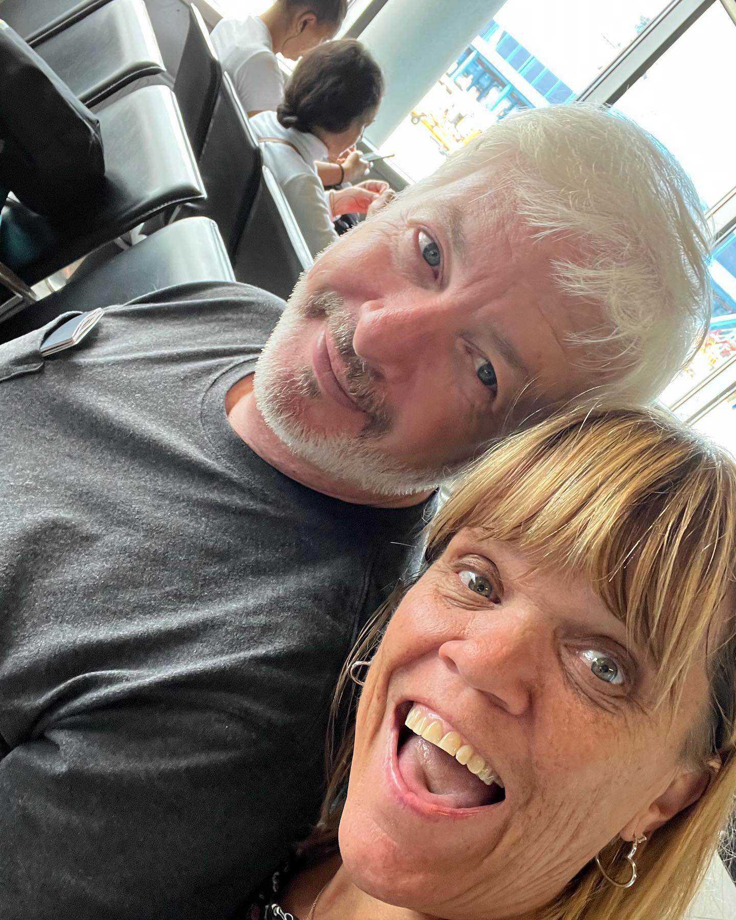 Amy shows off her wedding ring alongside Chris, subtly dismissing separation rumors.