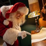A jolly Santa checking his list twice.